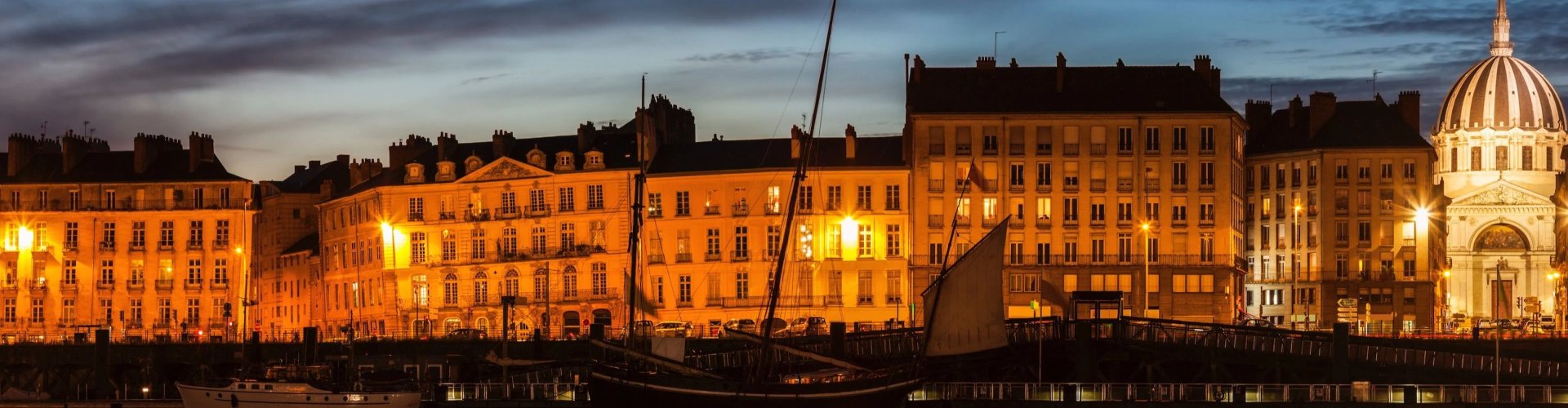 Scenic view of Nantes cityscape at sunset